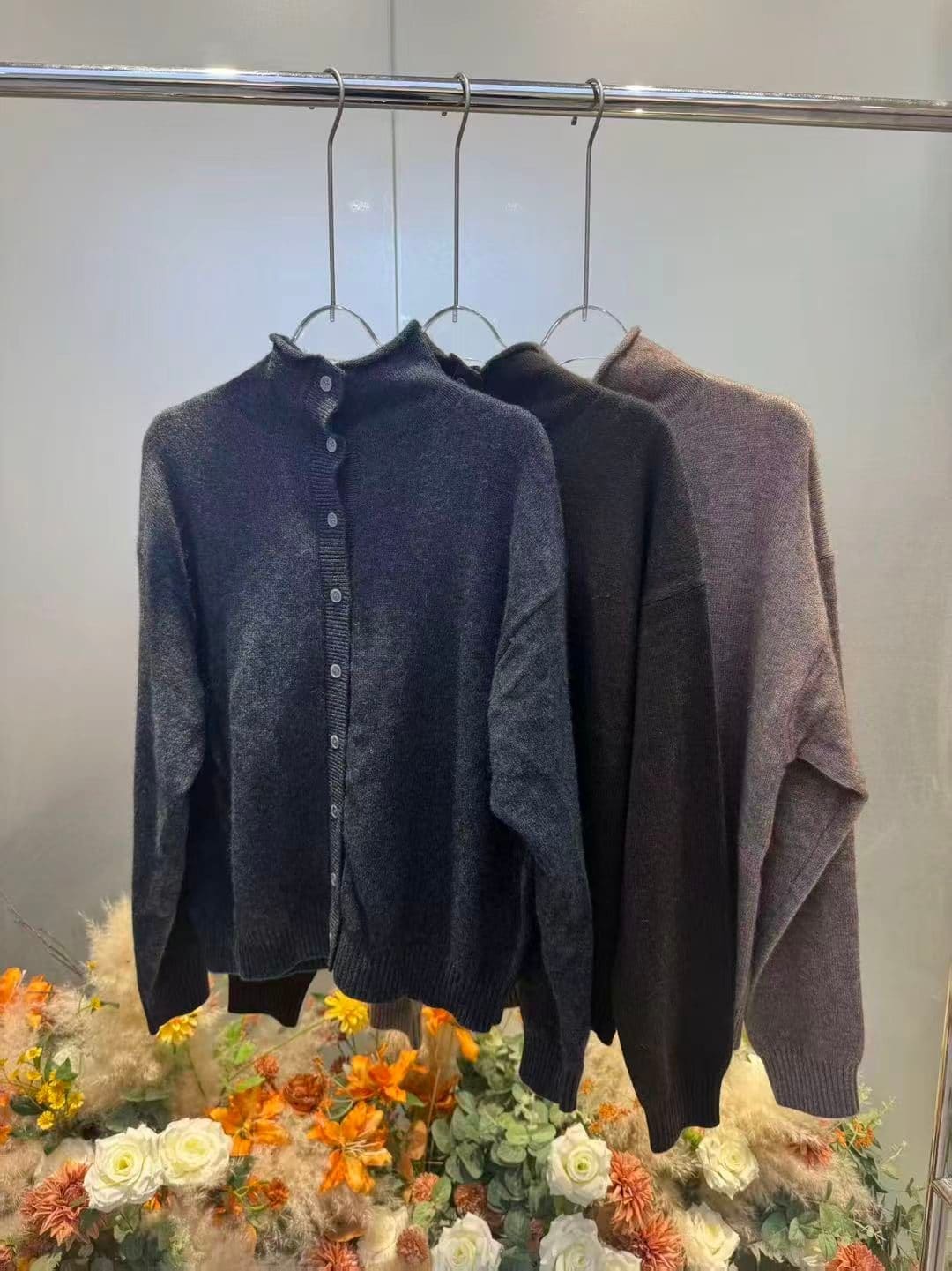 货号2626638 波尔牛绒不并丝排扣开衫_嘉兴明臻禧服饰有限公司